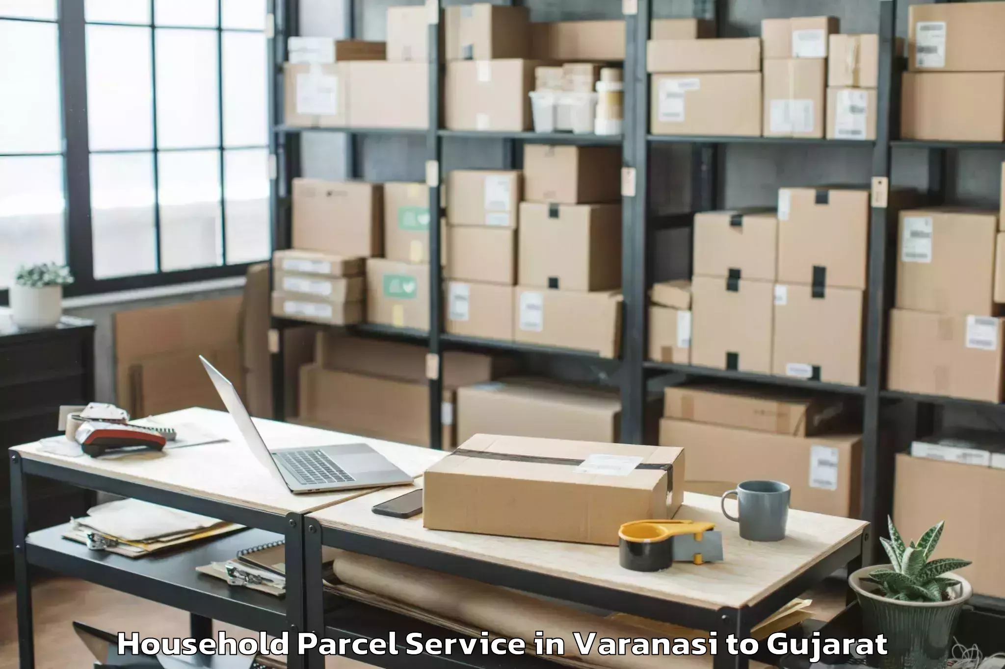 Reliable Varanasi to Kadi Sarva Vishwavidyalaya Gan Household Parcel